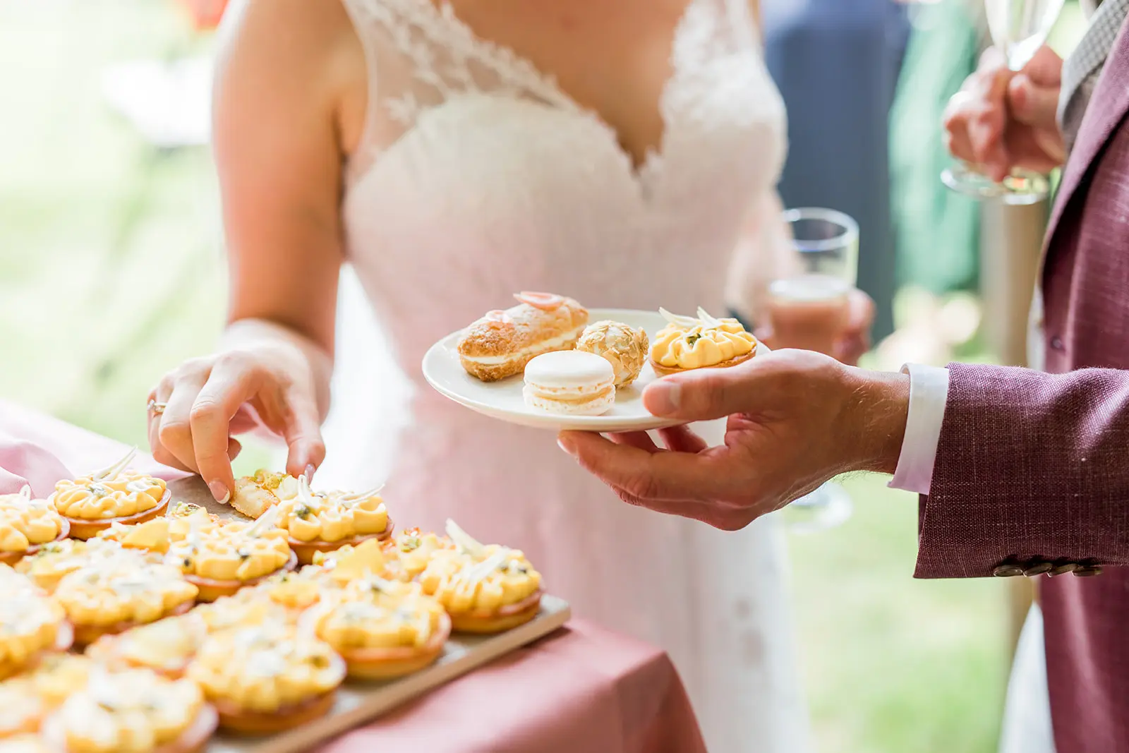 Wedding guests enjoying petit fours